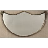 An Art Deco metal framed hall mirror with bevel edged glass and shaped top.