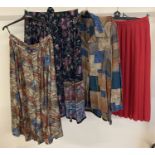 3 vintage 1980's skirts, one with matching scarf. Together with a blouse and skirt set.