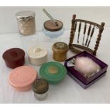 A small quantity of vintage powder and vanity pots.