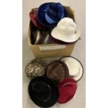 A large box of assorted vintage felt and wool ladies hats