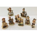 8 West German Goebel ceramic Hummel figurines.
