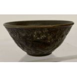 A small Chinese bronze bowl with elephant detail to outer bowl.