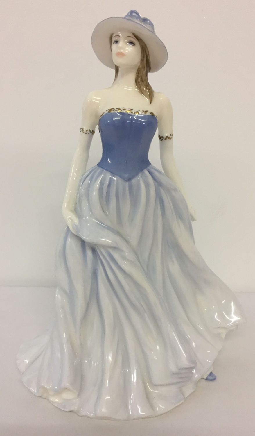 A Limited Edition Royal Doulton ceramic figurine entitled "Summer Breeze", from Compton & Woodhouse.