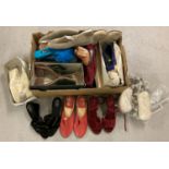 A box of assorted vintage slippers and house shoes.