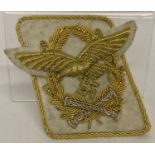 A WWII style German Luftwaffe General Field Marshall collar tab. Gold bullion eagle, oak leaves and