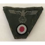 A German WWII style overseas cap cloth embroidered badge.