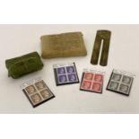 4 set of WWII Third Reich 1942 stamps together with 2 field dressings and a brass button polisher.