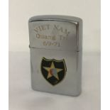 A Vietnam War style windproof lighter with engraved detail for 2nd Infantry Division.