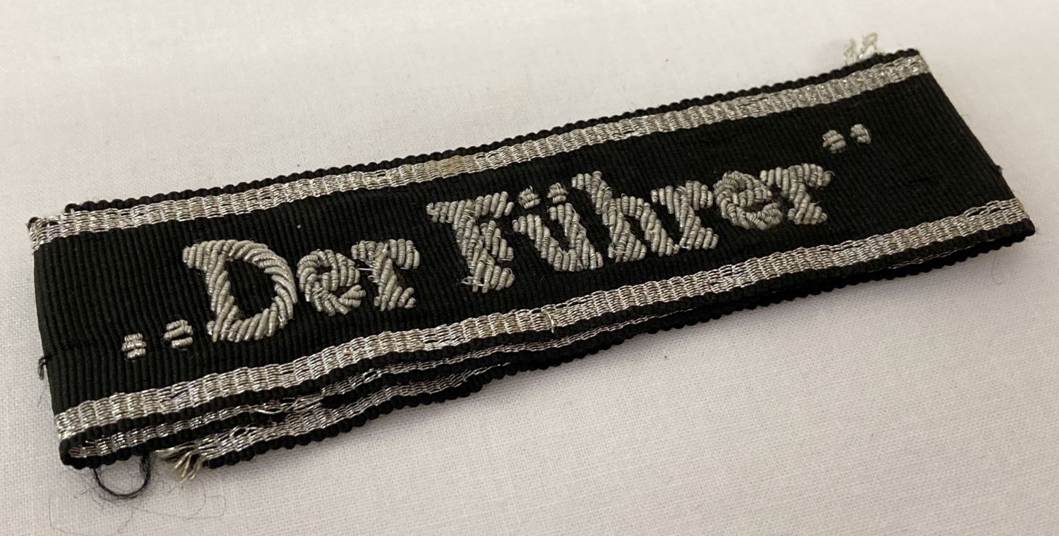 A WWII style SS "Der Furhrer" cuff title.