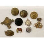 A small collection of military buttons a sweetheart brooch and a Italian helmet pendant.