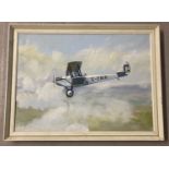 A framed oil on canvas of a De Havilland DH51 G-EBIR bi plane "Miss Kenya" by Noel A. Bray.