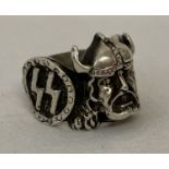 A white metal German SS Waffen Viking design ring.