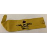 A WWII style Civil Defence Corps Rescue armband with buckle fastening.