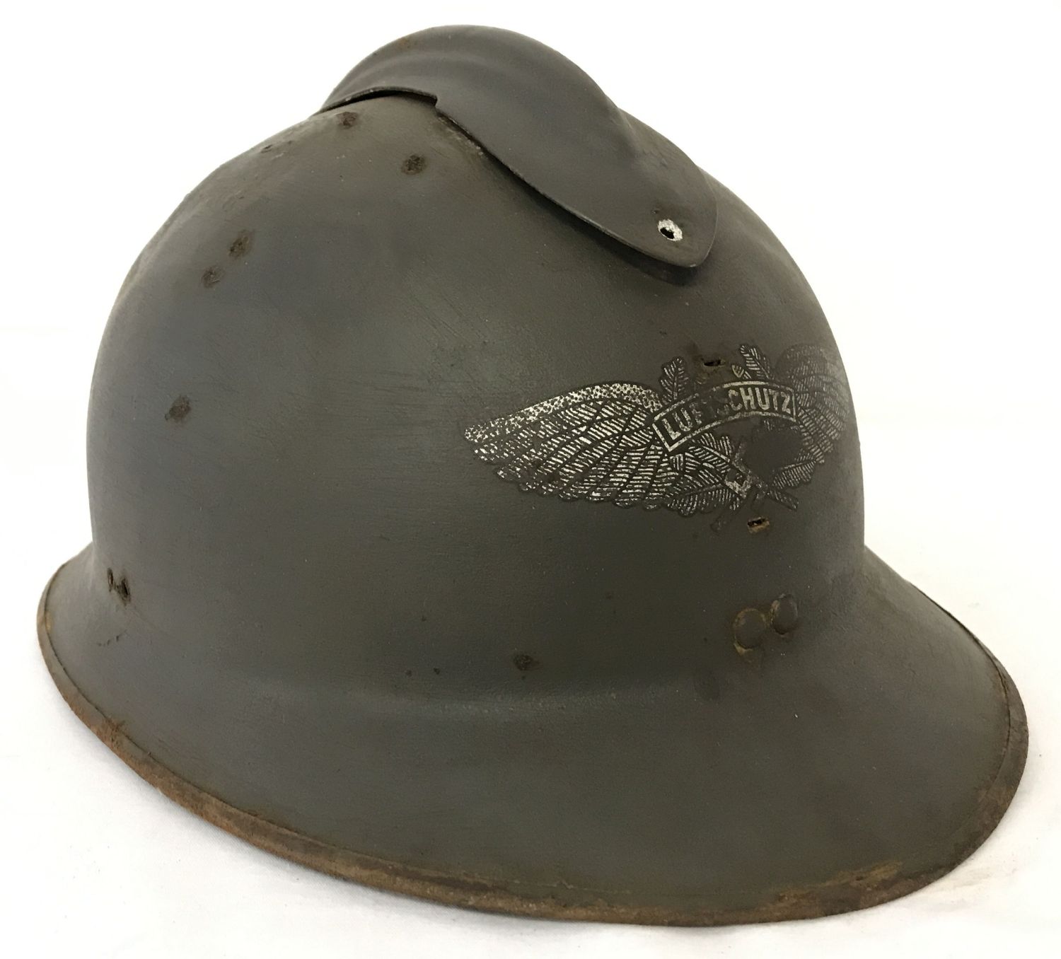 A WWII style captured French M23 Casque helmet used by the German Luftshutz (Air Raid Police).
