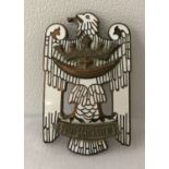 A German Post WWI style Friekorps badge with white enamelled detail.