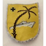 A WWII style German Kreigsmarine Africa campaign sleeve badge.