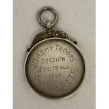 An antique silver watch fob/medallion engraved "Lance Corpl R. Harrison" to front.