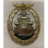 A WWII style German Kreigsmarine high seas fleet badge.