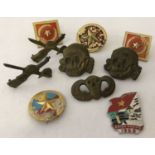 10 Vietnam War era badges to include screw back, pin back and lug fixings.