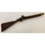 An antique brass barrelled flintlock Blunderbuss.