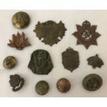 A bag of metal detecting found military badges and buttons.