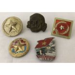 A small collection of Vietnam era Viet Cong badges.