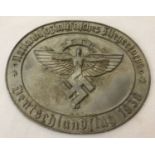 A German WWII style N.S.F.K oval shaped plaque.