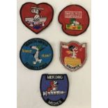 5 Vietnam War era embroidered Snoopy patches.