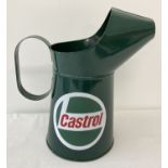 A decorative green 4L Castrol oil jug.