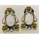 A pair of Art Nouveau style, 925 silver, miniature picture frames with enamelled flower detail.