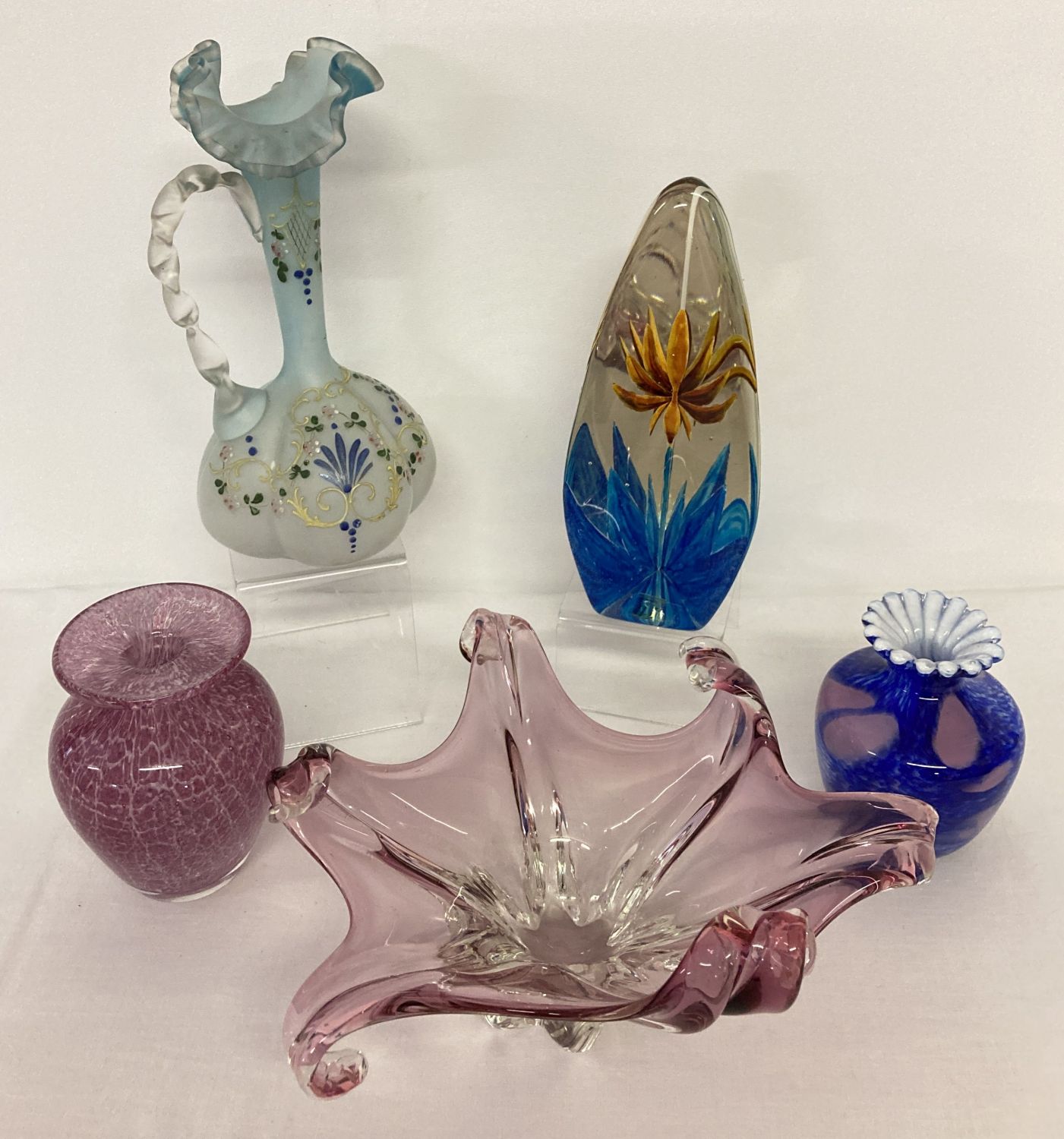5 pieces of glass ware to include Caithness and Maltese style vases.