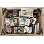 A box of vintage audio cassettes tapes. To include Dire Straits, Gary Moore, Eric Clapton,