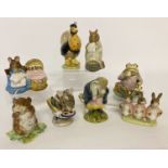 8 Beatrix Potter ceramic figures by Beswick.
