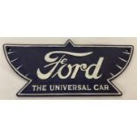 A blue and white painted cast iron Ford wall plaque.