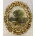 An oval gilt framed oil on board of a rural scene. Indistinct signature to bottom left.