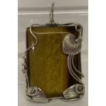 A large rectangular shaped Art Nouveau style 925 silver and tigers eye pendant.