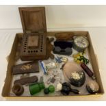 A box of mixed vintage items to include a carved wood cigarette box with matching match box case.