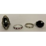 4 silver and white metal, stone set dress rings.