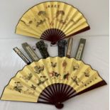 A collection of 4 Chinese fans. 2 boxed hand painted paper fans.