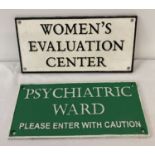 2 painted cast metal wall plaques. Women's Evaluation Center together with Psychiatric Ward.