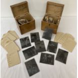 2 wooden boxes containing a quantity of assorted vintage photographic negative glass plates.