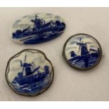 3 delft ceramic brooches depicting windmills.