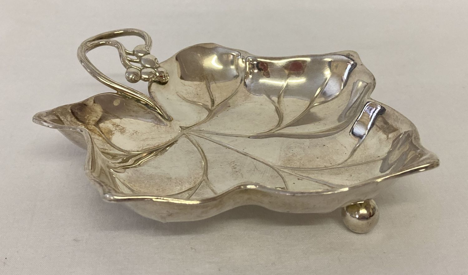 A WMF Ikora, ivy leaf shaped, silver plated bon bon dish on 3 ball feet.