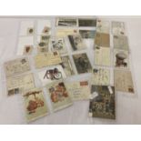 A collection of 24 antique and vintage postcards, first day covers and hand written envelopes.