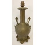 An Art Nouveau style vintage brass lamp base.