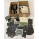 2 boxes of assorted vintage photographic negatives.