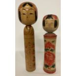 2 large vintage wooden Japanese Kakashi dolls, both with signatures to underside.