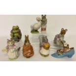 8 Beatrix Potter ceramic figures by Beswick.