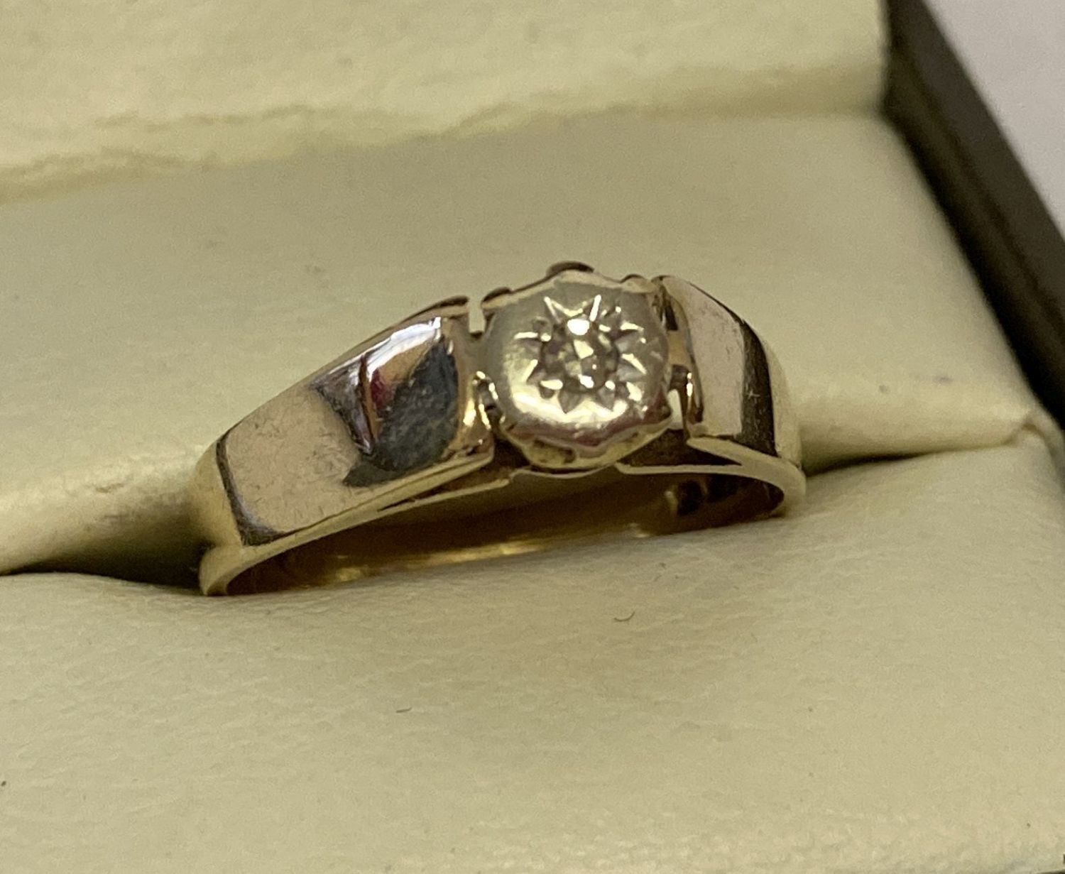 A vintage 9ct gold illusion set solitaire diamond ring.