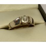 A vintage 9ct gold illusion set solitaire diamond ring.